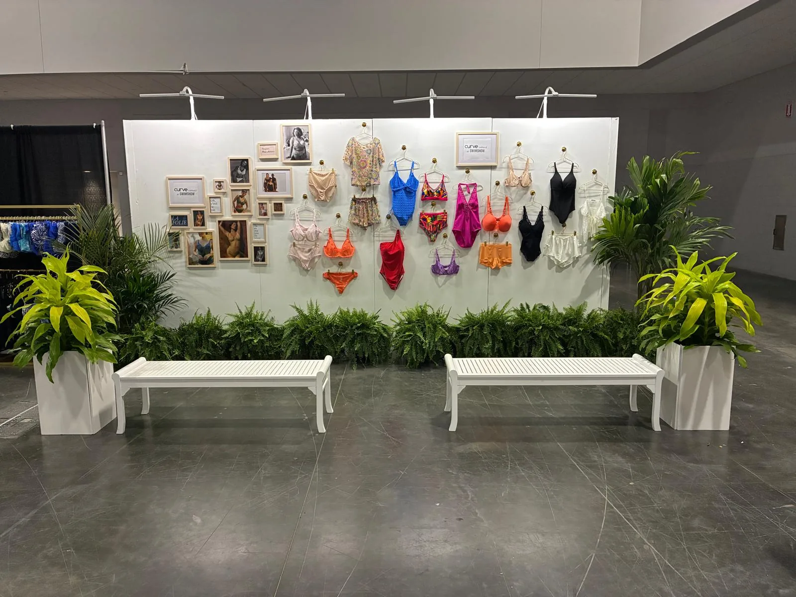 Tropical ferns and greenery styling a Curve trade-show booth